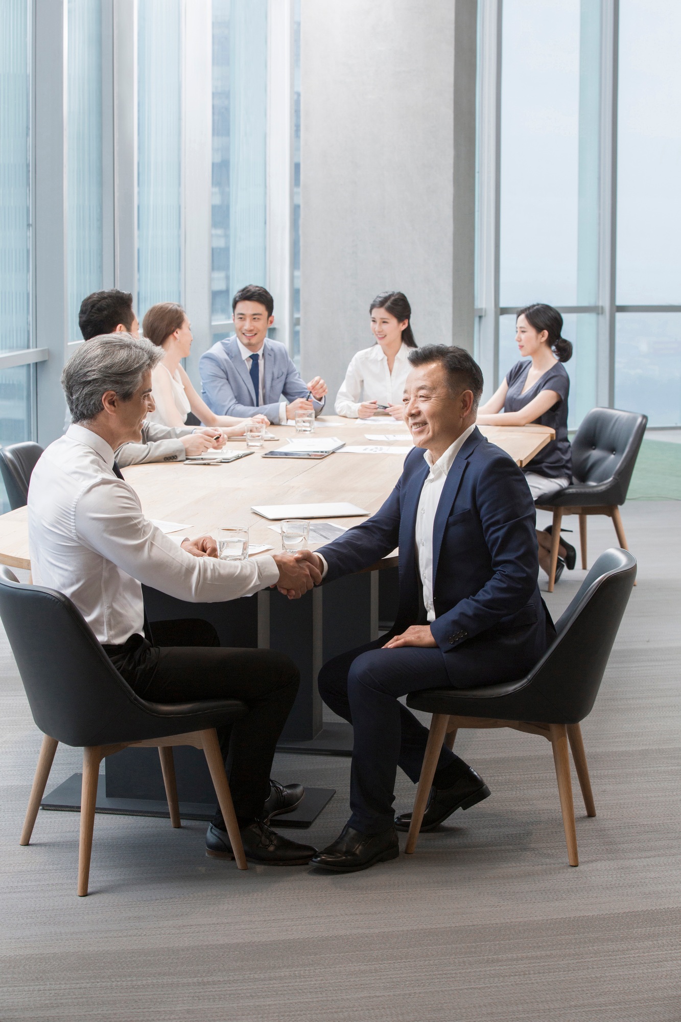 Business people having meeting in board room